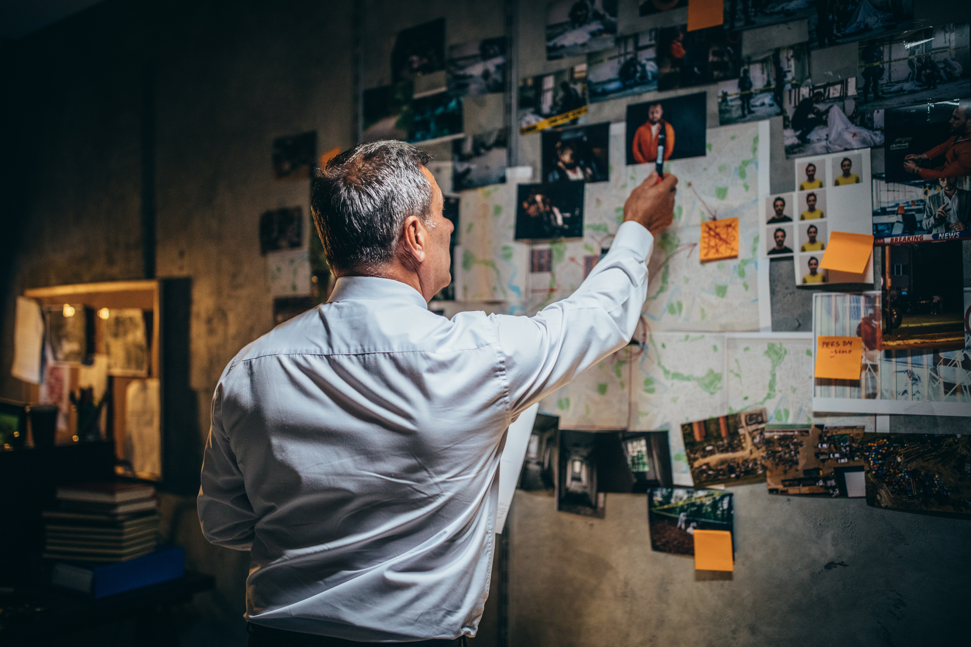 Detective examining evidences